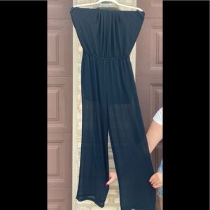 Black jumpsuit with sheer legs